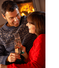 couple enjoying a fire